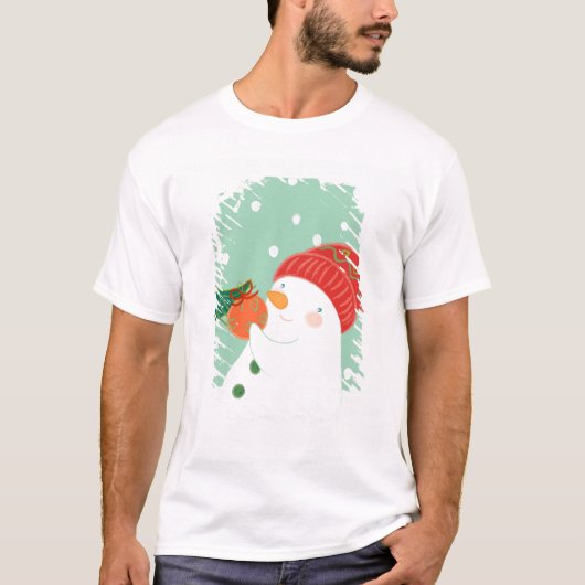 Een sneeuwman die een versiering aan een boom hang t-shirt (Voorkant)