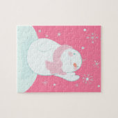 Een sneeuwman die naar een vallende sneeuwvlok rei legpuzzel (Horizontaal)