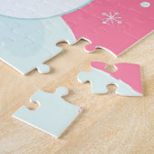 Een sneeuwman die naar een vallende sneeuwvlok rei legpuzzel (Zijkant)