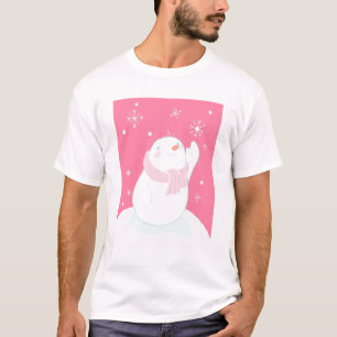 Een sneeuwman die naar een vallende sneeuwvlok rei t-shirt