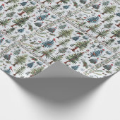 Een sneeuwman en kerstbomen in een gewatteerd patr cadeaupapier (Hoek)