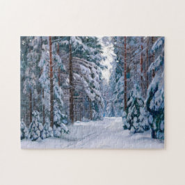 Een sneeuwpad in het bos legpuzzel