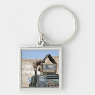 Een soldaat geeft opdracht aan een Irakese soldaat Sleutelhanger