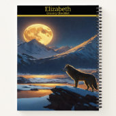 Een solitaire wolf sereneert de volle maan 's nach notitieboek (Achterkant)