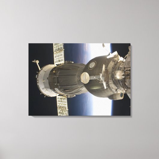 Een Soyuz ruimteschip dat door de Aarde is terugge Canvas Afdruk (Voorkant)