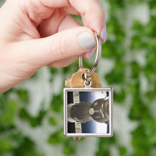 Een Soyuz ruimteschip dat door de Aarde is terugge Sleutelhanger (Hand)
