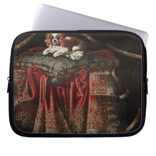 Een spaniel op een geborduurd kussen laptop sleeve