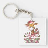 Een speelse kerstgiraffe sleutelhanger (voorkant)