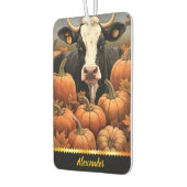 Een speelse koe te midden van kleurrijke pompoenen luchtverfrisser (Links)