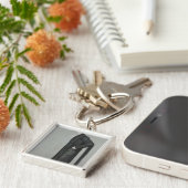 Een Sportjurylid vormt Vanity Fair Sleutelhanger (Zijkant)