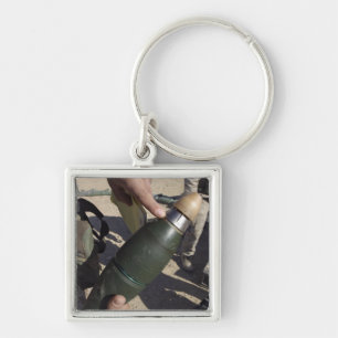 Een squad leider richt aan een vertraging het plaa sleutelhanger