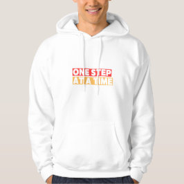 Eén Stap per Tijd – Inspirerende Voortgangsquote Hoodie