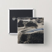 Een statische vertoning van een ordnance shell vierkante button 5,1 cm (Voorkant /achterkant)