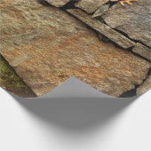 Een stenen muur gemaakt van cobblestenen achtergro cadeaupapier (Hoek)