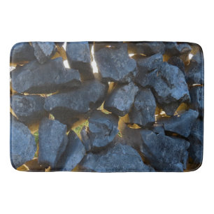 Een stenen muur in Kroatische stijl Badmat