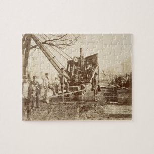 Een stoomkraan in bedrijf tijdens de bouw legpuzzel