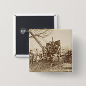 Een stoomkraan in bedrijf tijdens de bouw vierkante button 5,1 cm (Voorkant /achterkant)