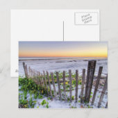 Een strand omheining bij zonsondergang briefkaart (Voorkant / Achterkant)