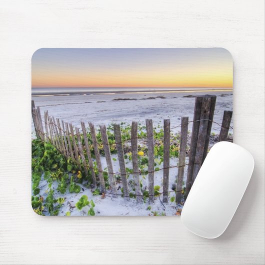 Een strand omheining bij zonsondergang muismat (Met muis)