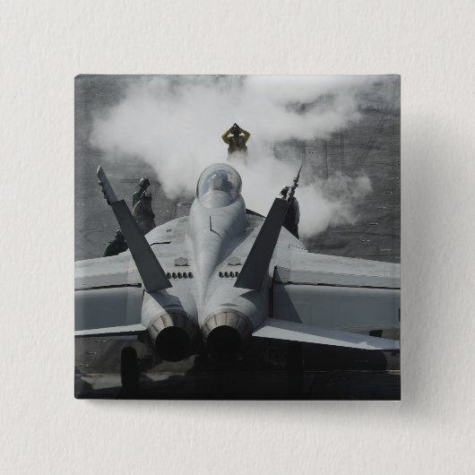 Een stuurhutregisseur signaleert een F/A-18F Vierkante Button 5,1 Cm (Voorkant)