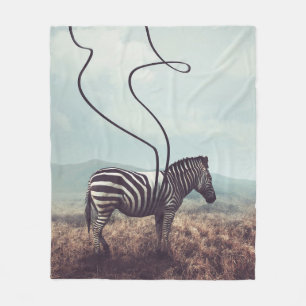 Een surrealistisch afbeelding van een zebra en twe fleece deken