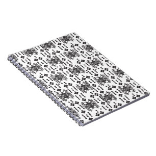 Een symmetrisch monochroom ontwerp met ingewikkeld notitieboek