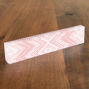 Een symmetrisch patroon met rode en roze moti naambordje