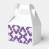 Een symmetrisch patroon met witte en paarse m bedankdoosjes (Achterkant)