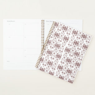 Een symmetrisch wit inpakpapier met een rep planner