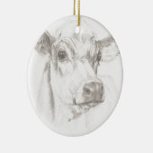 Een tekening van een jonge koe keramisch ornament (Rechts)