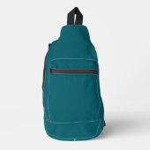 Een turkooisblauwe textuurachtergrond vult de afbe sling bag (Voorkant)