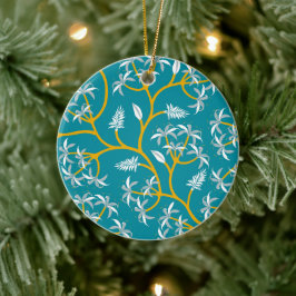 Een turquoise cirkelvormige versiering met gouden  keramisch ornament
