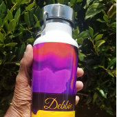 Een uitbarsting van Paarse en geel Waterfles