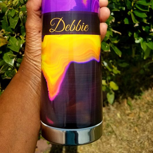 Een uitbarsting van Paarse en geel Waterfles