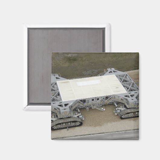 Een uitzicht van de kruipwagen magneet (Voorkant / Achterkant)