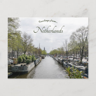 Een Uitzicht van een gracht in Amsterdam Nederland Briefkaart