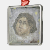 Een van de vier winden, detail van de metalen ornament (Links)