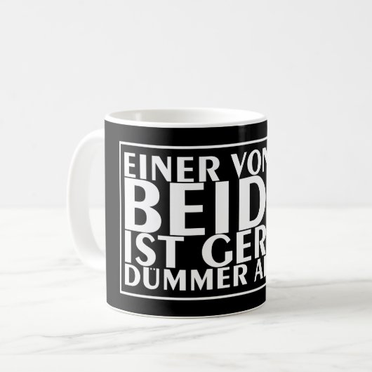 Een van ons beiden is momenteel dommer dan ik 01 koffiemok (Voorkant links)