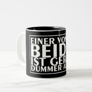 Een van ons beiden is momenteel dommer dan ik 01 tweekleurige koffiemok