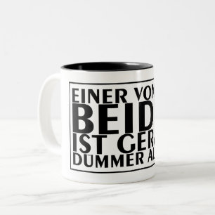 Een van ons beiden is net dommer dan ik 01 tweekleurige koffiemok