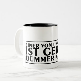 Een van ons beiden is net dommer dan ik 01 tweekleurige koffiemok