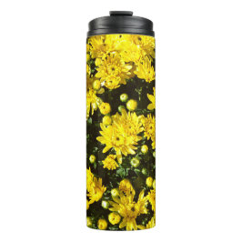 Een veelheid van gele mama's thermosbeker