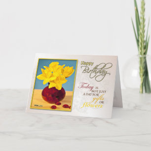 Een verjaardagskaart met gouden narcissen kaart