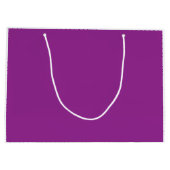 Een verloopachtergrond die tinten roze en groot cadeauzakje (Achterkant)