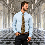 Een vleugje tijdloze genade - Elegant Reverie Stropdas<br><div class="desc">Stap in een wereld van verfijnde elegantie elke keer dat u de Elegant Reverie Stropdas doet. Doordrenkt met de allure van de Vlaamse barok, brengt het zwart-gouden bloemontwerp u naar een tijd van overdadige schoonheid en kunstzinnigheid. Dit is niet alleen een accessoire; het is een brug naar een vervlogen tijdperk...</div>