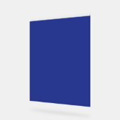 Een vliegtuig dat in de lucht vliegt met een blauw acryl bord (Hoek)