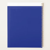 Een vliegtuig dat in de lucht vliegt met een blauw planner (Achterkant)