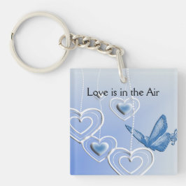 Een vlinder en hart sleutelhanger