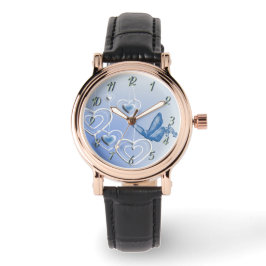 Een vlinder en harten horloge