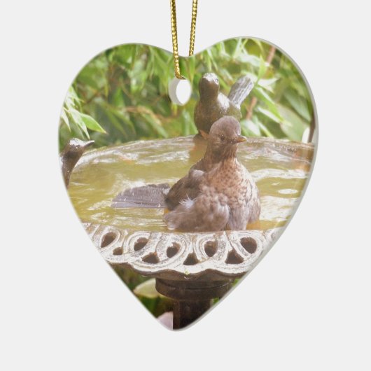 Een vogel in het bad keramisch ornament (Links)